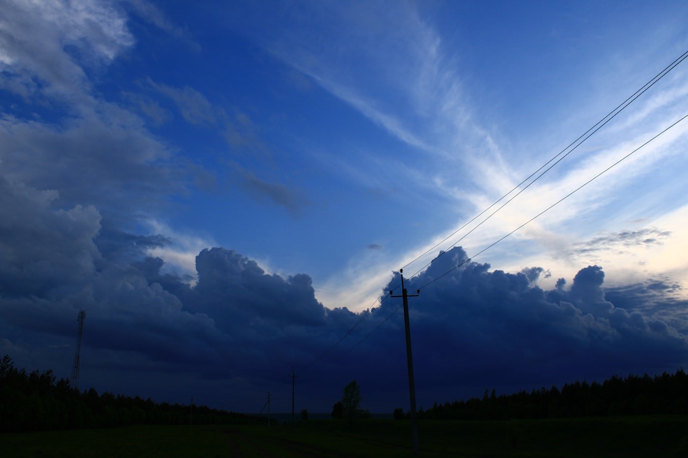Storm clouds over a dark landscape